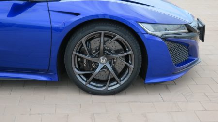 9077